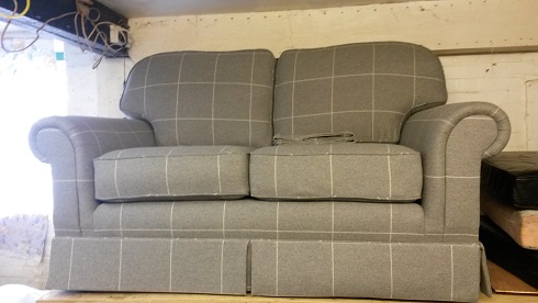 sofa recovered in wool check.