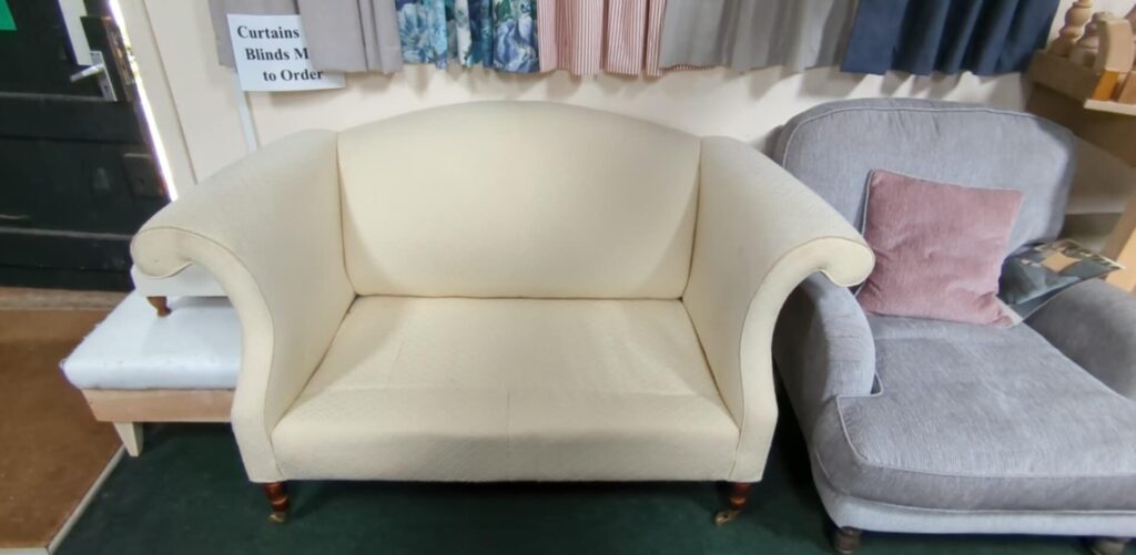 Two seater 'swan-neck' arm sofa. ready to be covered in fabric of choice. POA. (choice of seat cushion filling.)